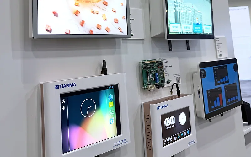 Tianma industrial LCD panels and a controller board mounted on our display wall at Display Week 2026